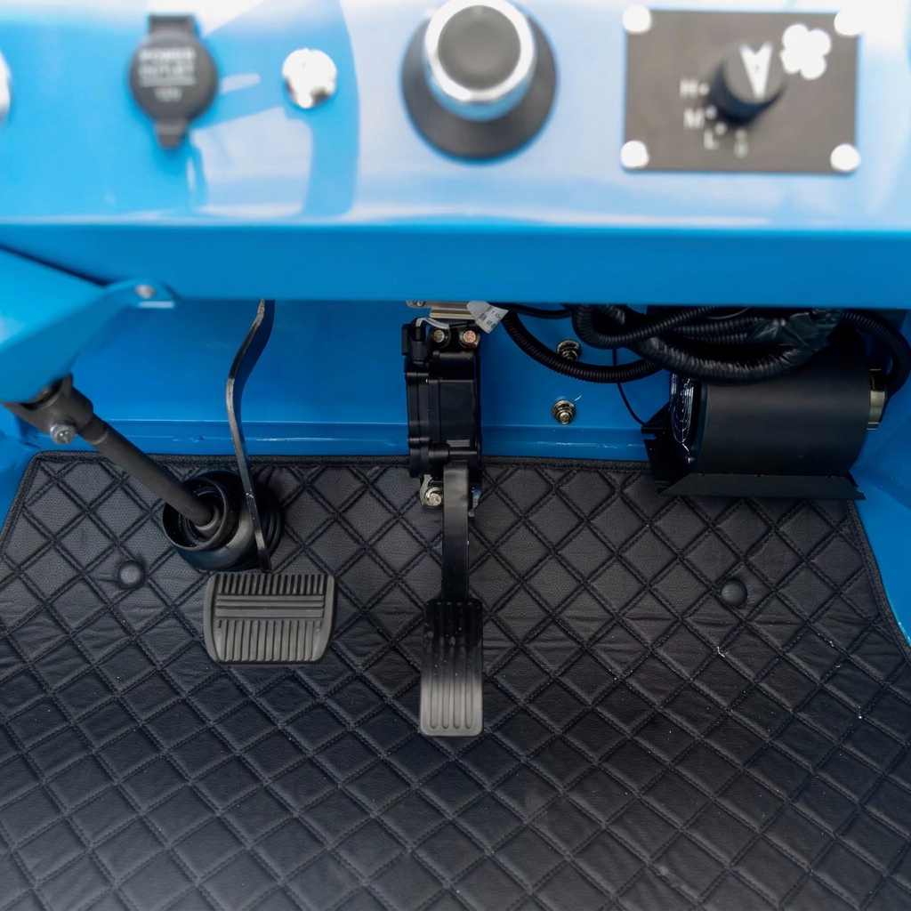 Capri driver footwell and quilted floor mat detail