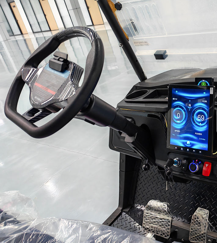 Monaco FF4 carbon fibre steering wheel and large digital touchscreen dash