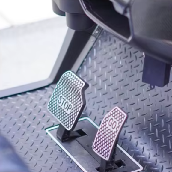 Monaco FF4 stainless STOP and GO pedals on diamond-plate floor