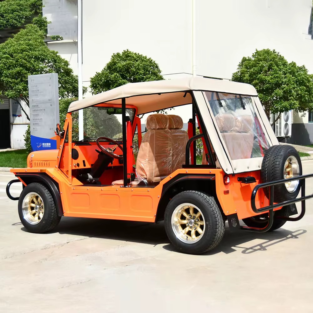 Orange Capri electric vehicle with cream canopy and gold alloy wheels