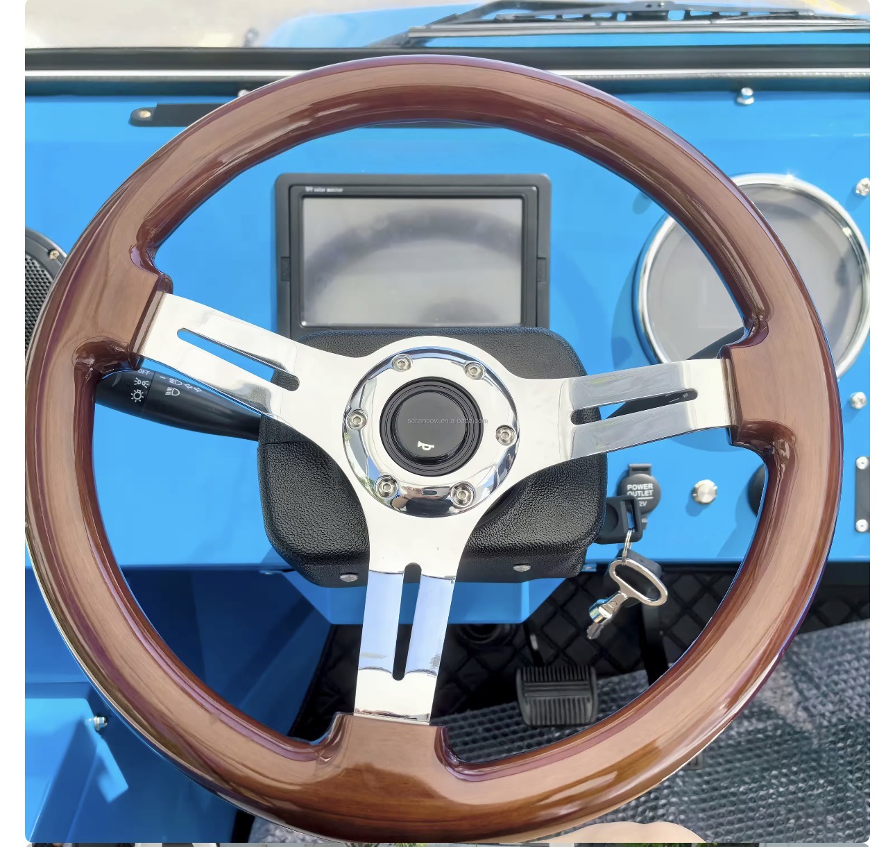 Capri wood steering wheel and driver controls