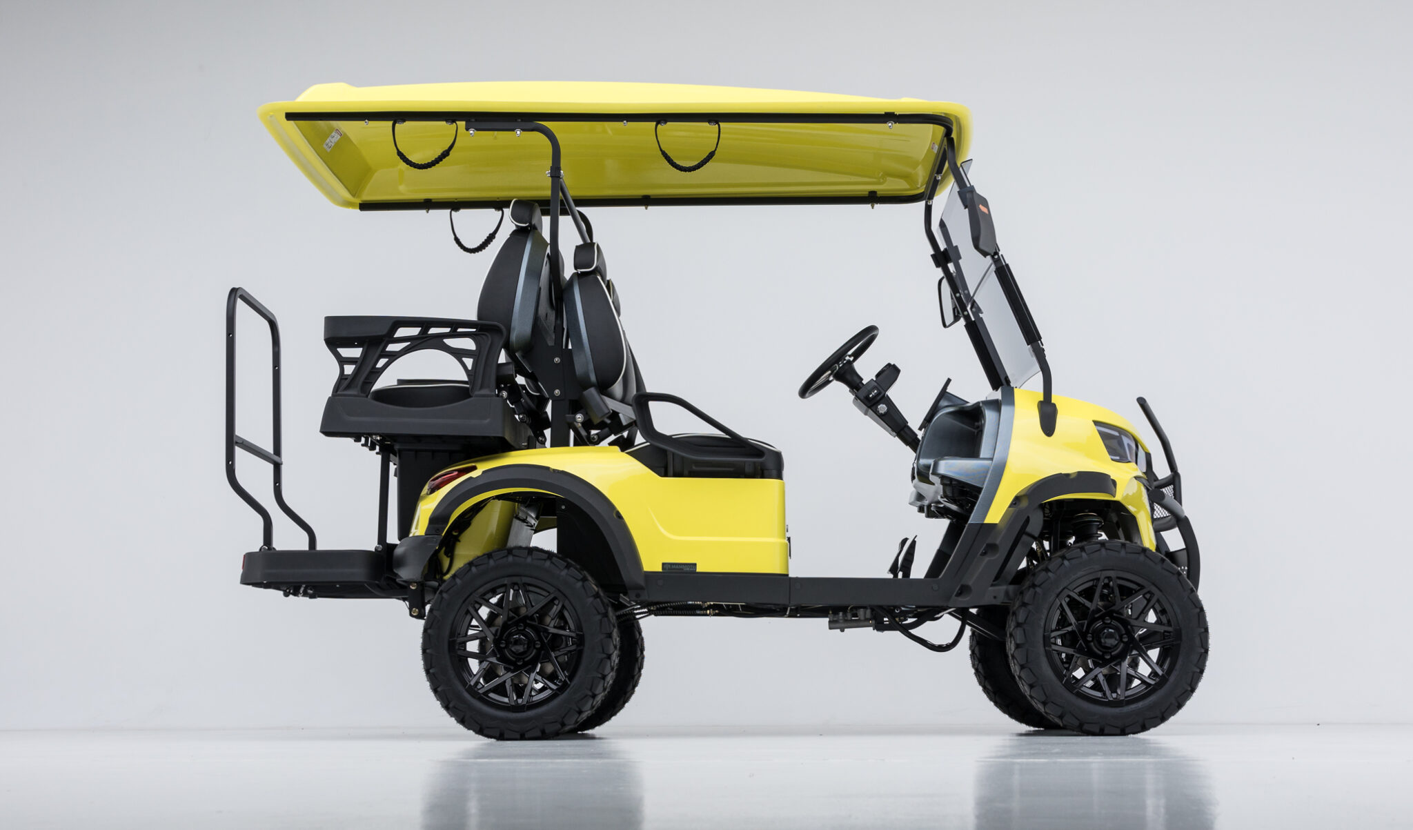 Luxury electric golf cart on the internal roads of a private residential domain